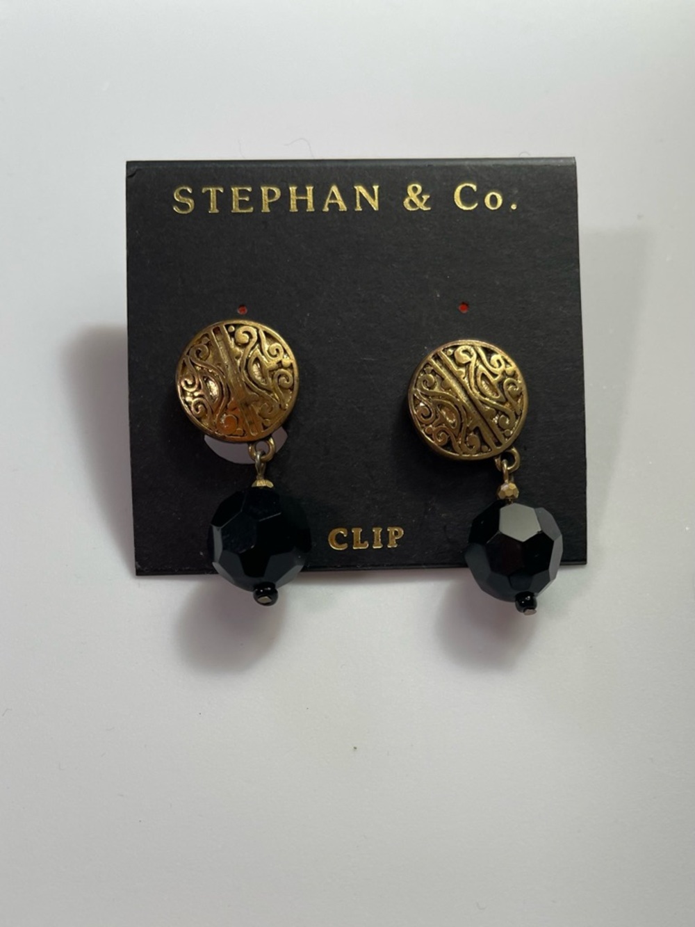 Vintage 80s Gold Filigree Clip-On Earrings with Black Faceted Drops